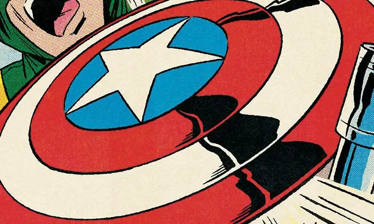 Close-up comic-style illustration of Captain America's shield with red, white, and blue concentric rings and a white star, aiming at a character's face