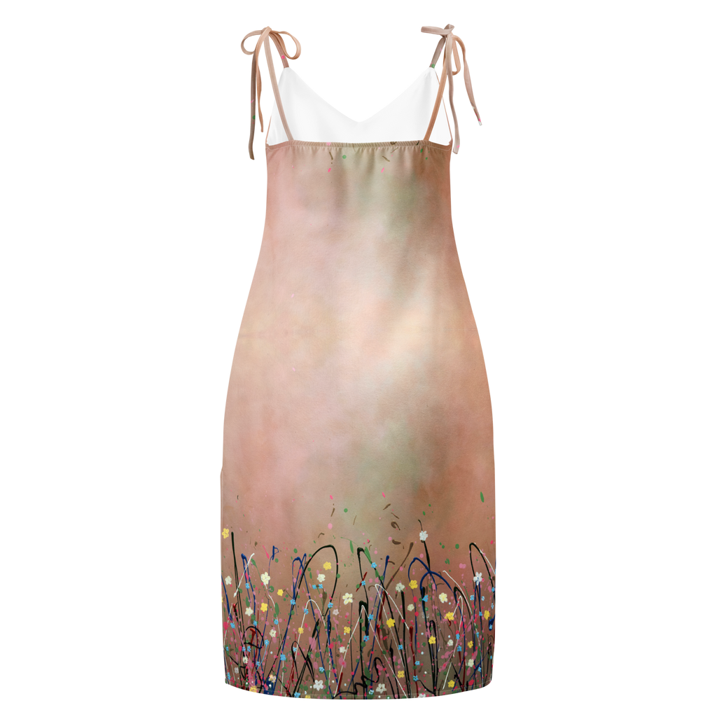 Dress with gradient design and floral pattern on a white background