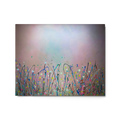 Abstract artwork with colorful splattered brush strokes and flowers on a rainbow gradient background