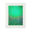 A Giclée framed art print featuring an impressionistic landscape painting of a green field with a vibrant pink and blue flower border under a bright green sky, presented with a wide white border protector on a white background.