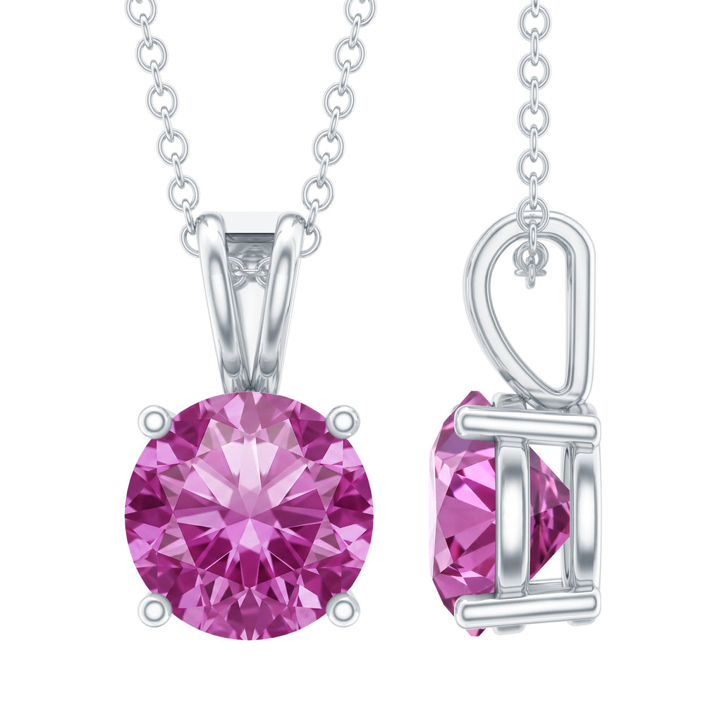 A silver pendant necklace with a round-cut pink gemstone, shown from the front and side angles on a plain white background.