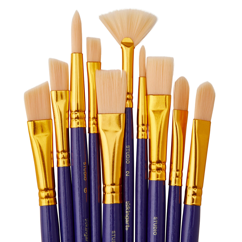 Set of paintbrushes with gold ferrules and purple wood handles