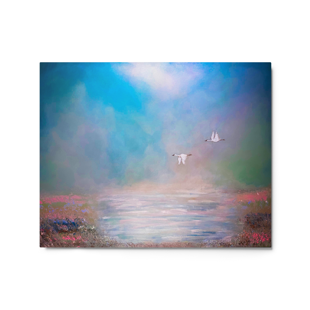 Two birds flying over a body of water with a colorful sky.